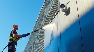 State System Pressure Washing a Commerical Building